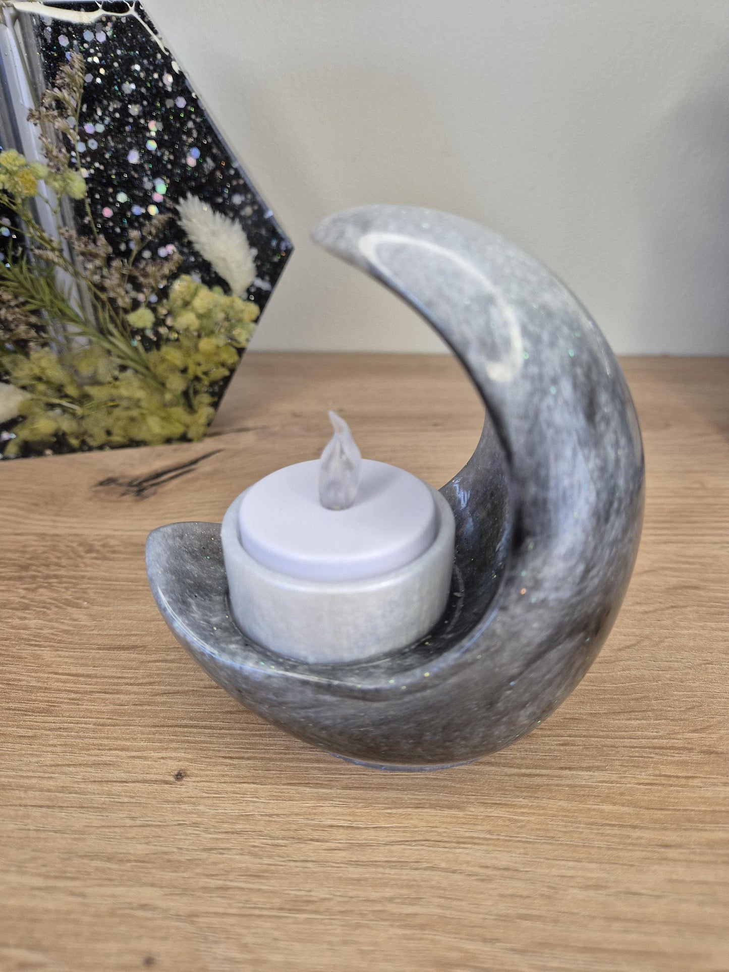 Moon shaped candle holder with led light